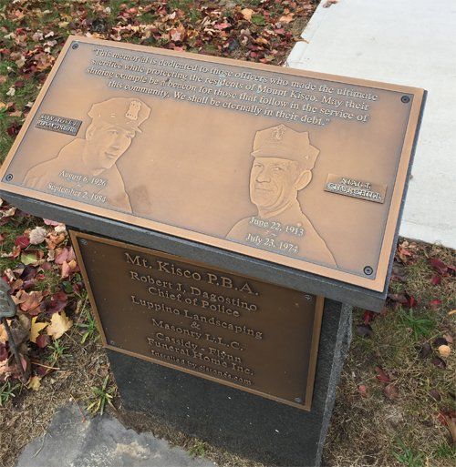 A granite and bronze civic memorial