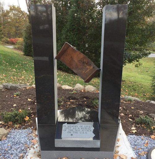 A granite and bronze civic memorial
