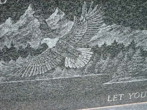 Etched detail on a granite memorial