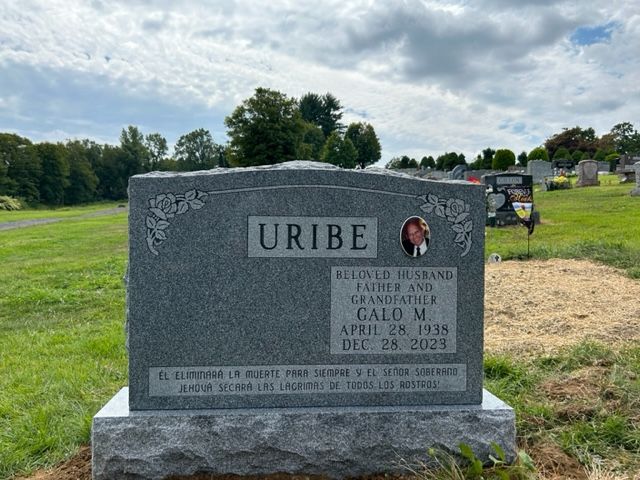 Granite memorial standing in a cemetery